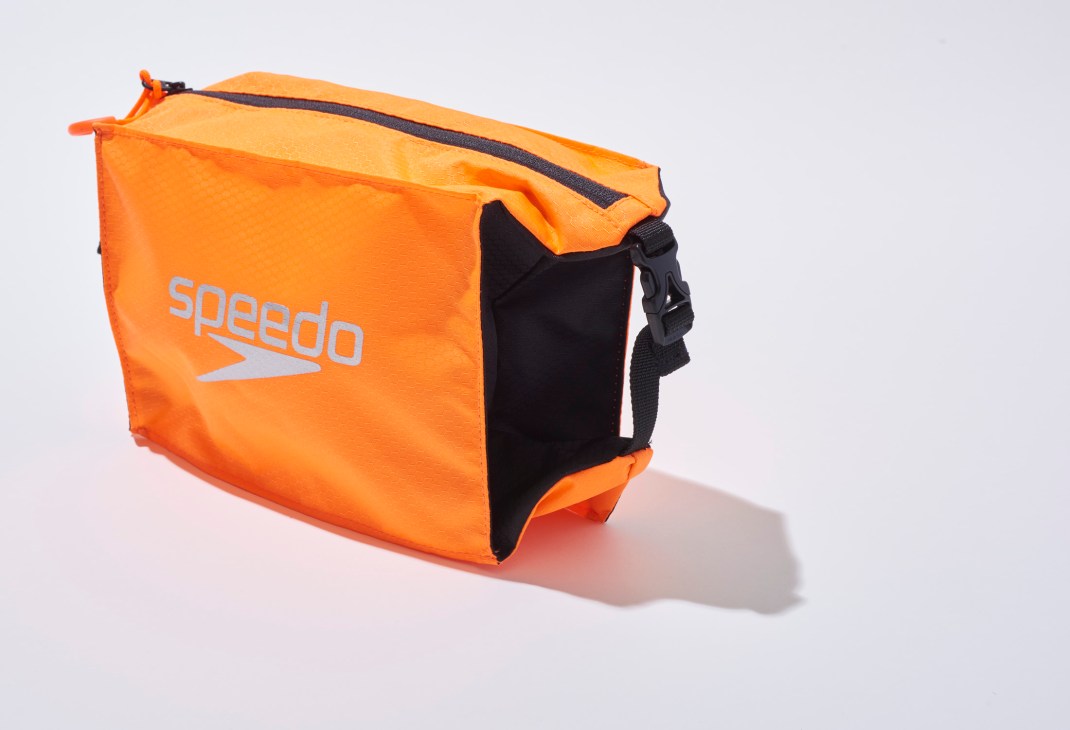 Orange Speedo waterproof bag with black trim and shoulder strap.