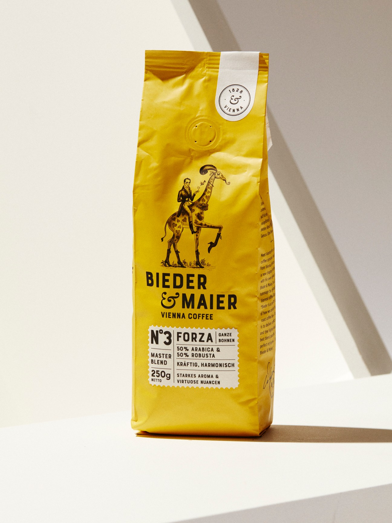 Yellow coffee package for Bieder & Maier Vienna Coffee with giraffe illustration