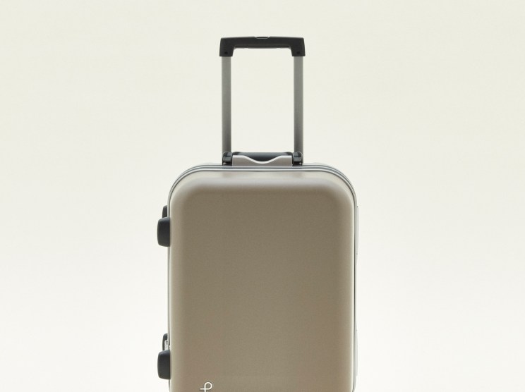 Proteca Equinox Light U grey carry-on suitcase with retractable handle and wheels.