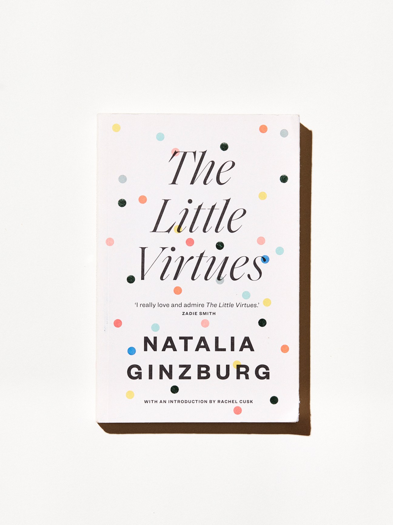 The Little Virtues book cover by Natalia Ginzburg with colorful polka dots on white background