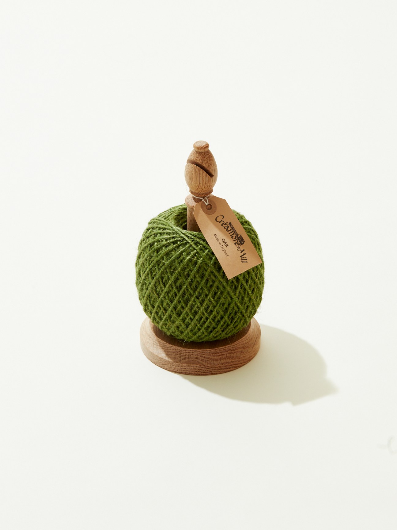 Hand-turned oak twine stand with built-in cutting blade by Creamore Mill