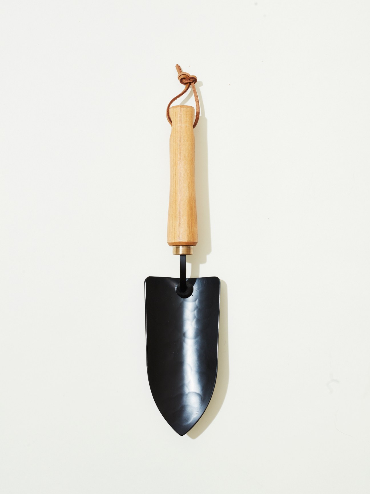 Precision planting trowel made in Niigata, Japan by Niwaki with wooden handle and dark metal blade