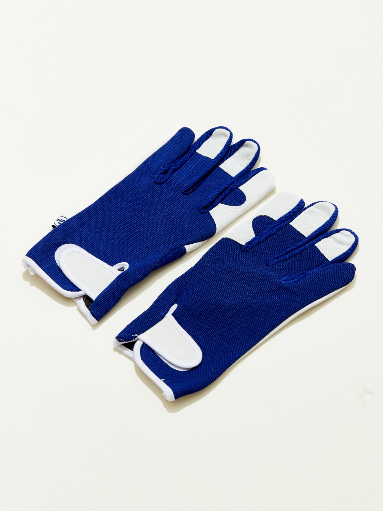Blue and white gardening gloves with elastic cuffs and textured palms