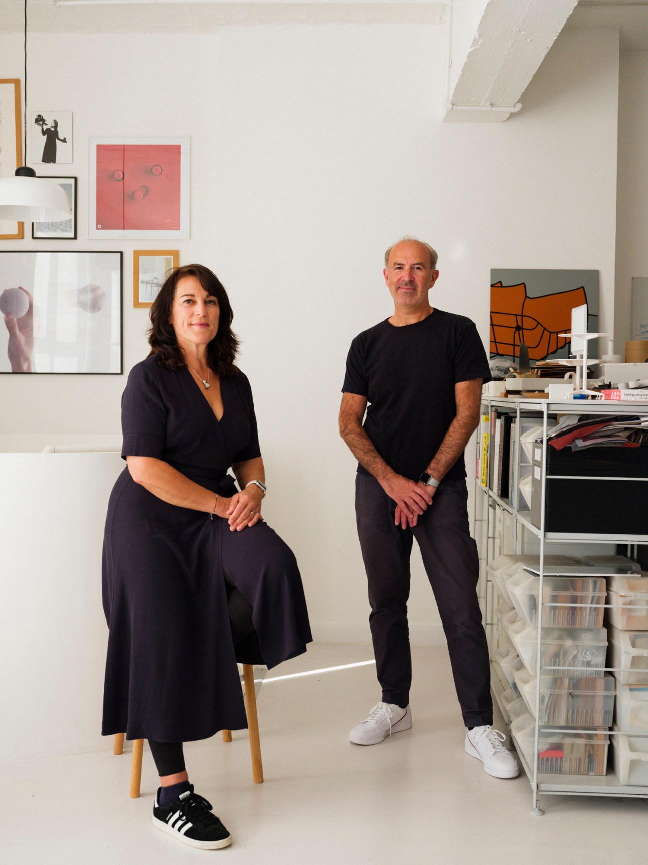 Kim Colin and Sam Hecht from Industrial Facility sitting in their London studio surrounded by design prototypes