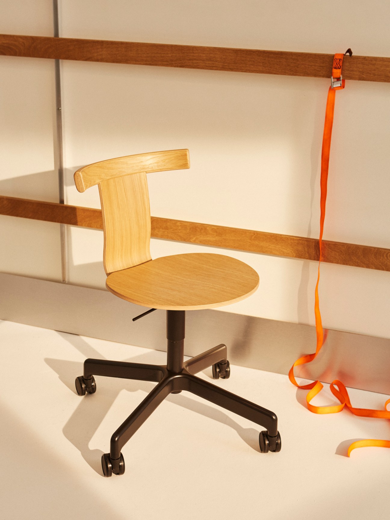 Jiro timber swivel chair by Resident showing Scandinavian-Japanese inspired minimalist design in natural oak finish
