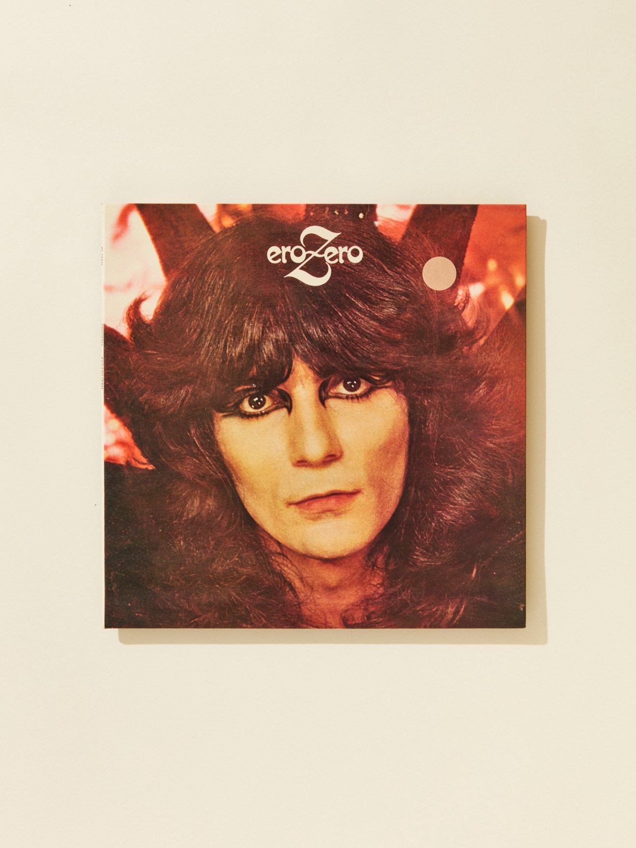 Renato Zero's 1979 album Erozero cover featuring a portrait of the artist with voluminous dark hair.