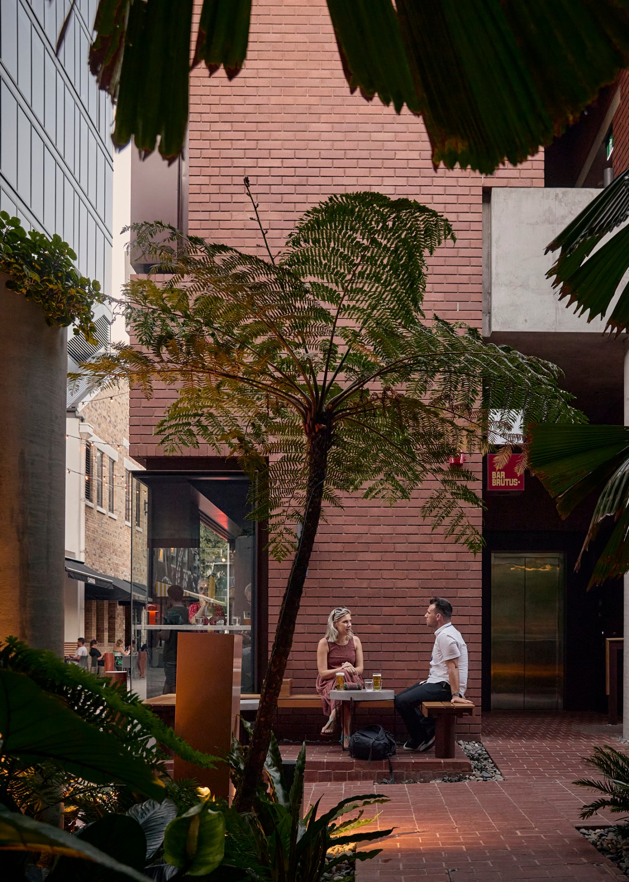 Warm tones and tropical awnings in Fish Lane