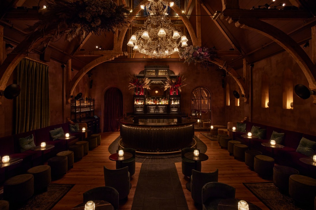 Chapel Bar's atmospheric interior featuring vaulted ceilings and sophisticated bar setup