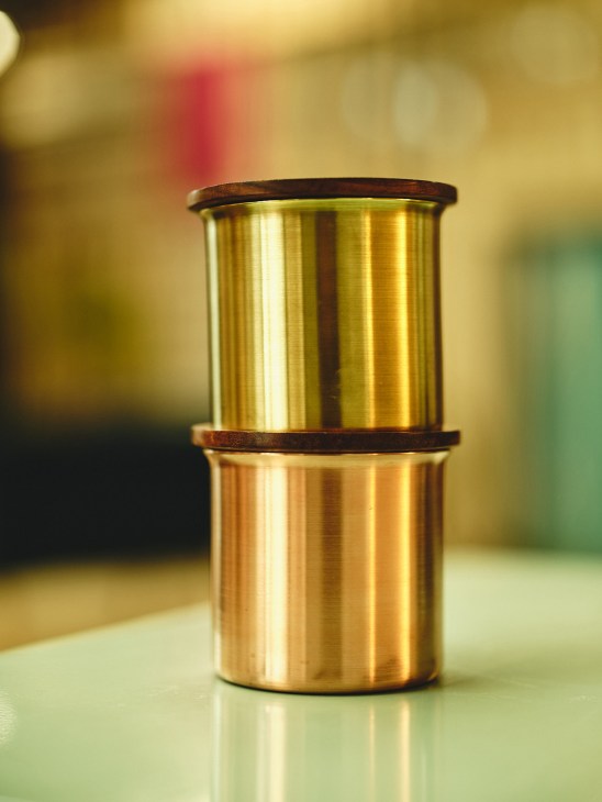 Brass candleholder with wooden rim by Tiipoi, handcrafted in Bangalore.