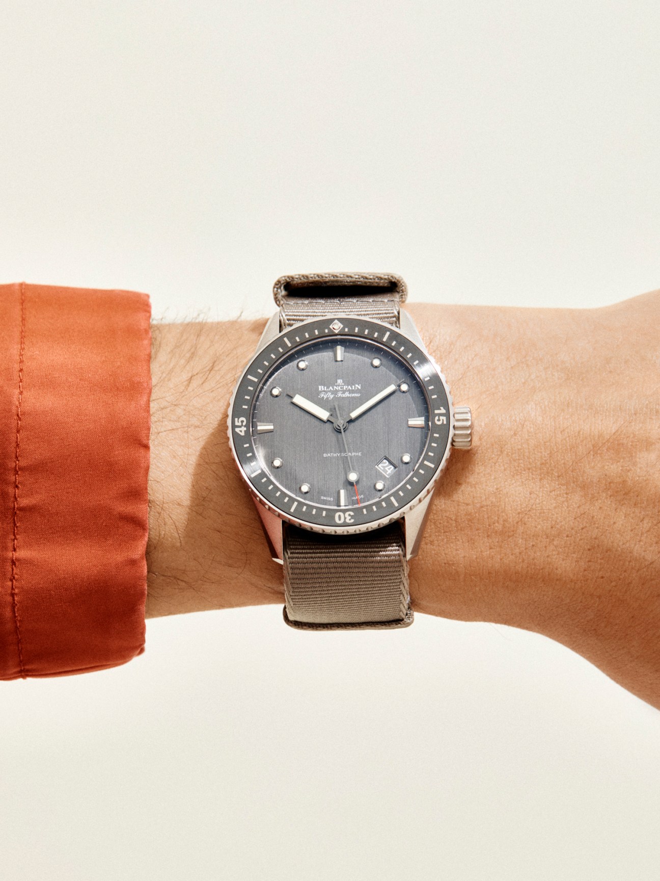 Fifty Fathoms Bathyscaphe diving watch by Blancpain worn on wrist with NATO strap