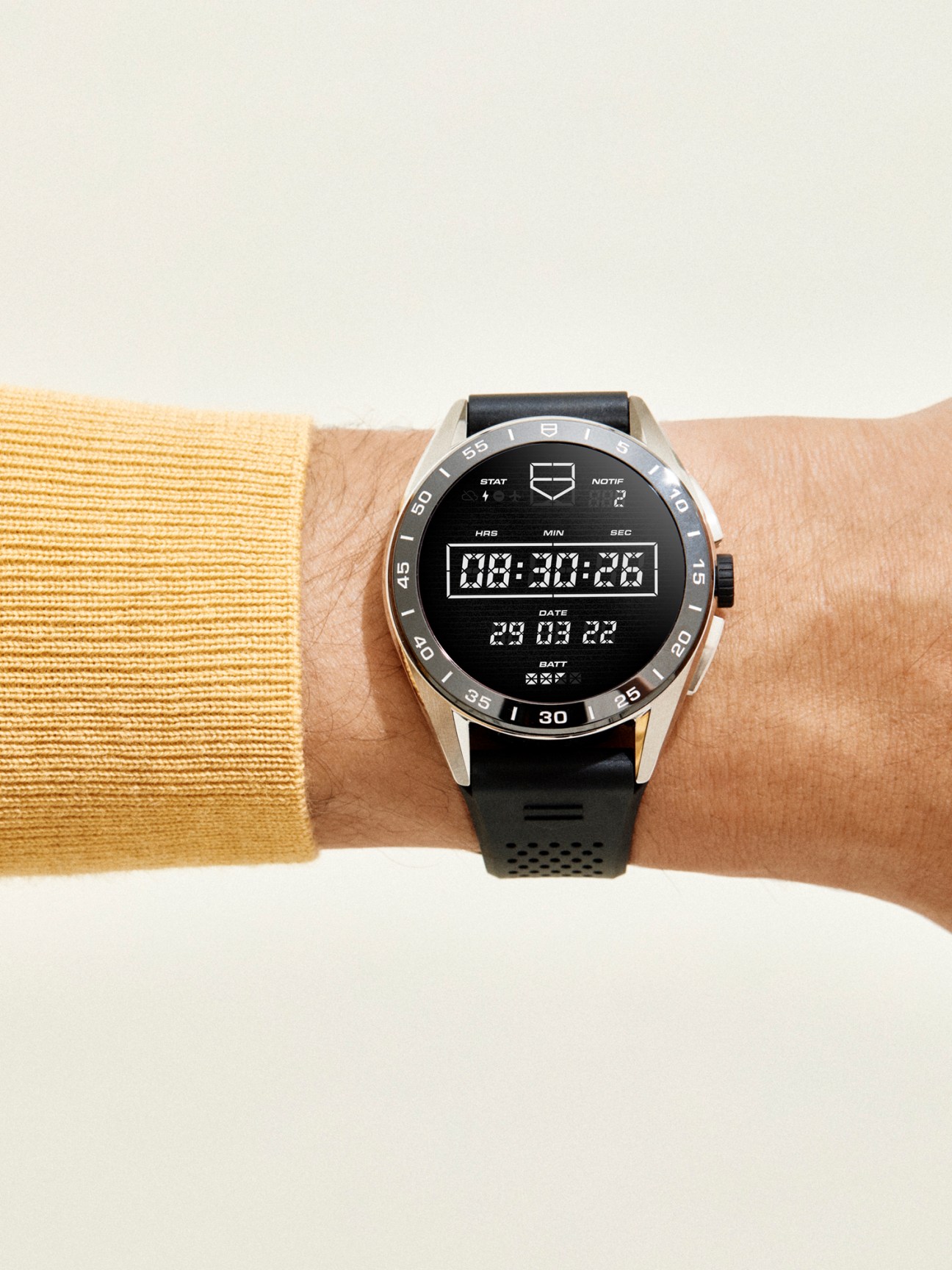Connected Calibre E4 smartwatch by Tag Heuer worn on wrist showing digital display