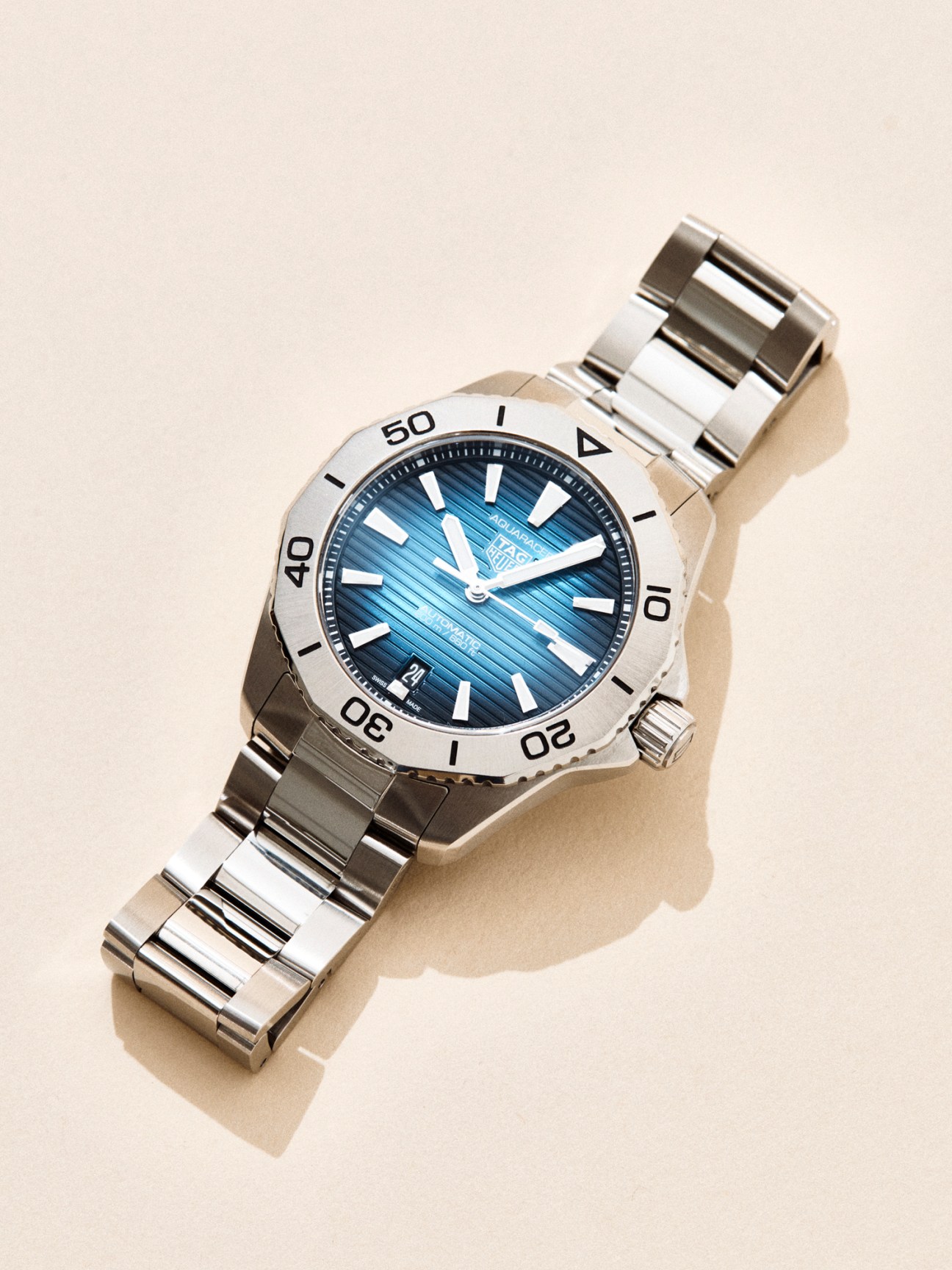 Blue dial sports watch with steel bracelet