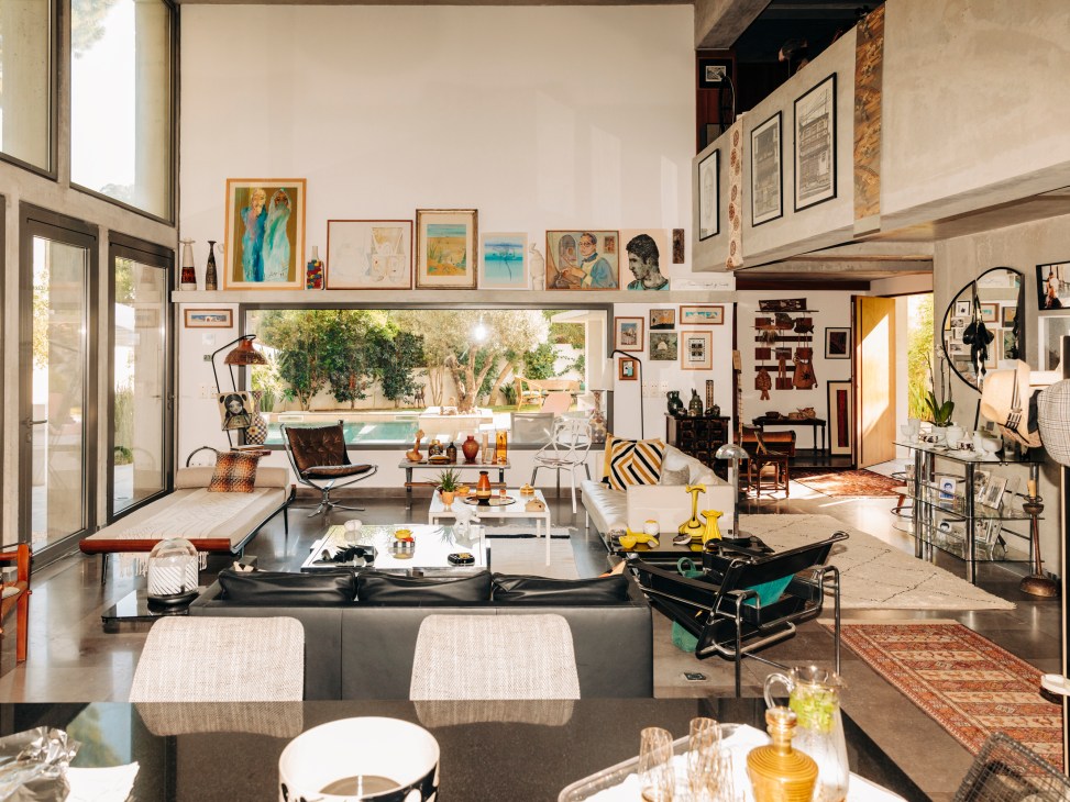 Mid-century suburban villa with yellow awnings and modernist design