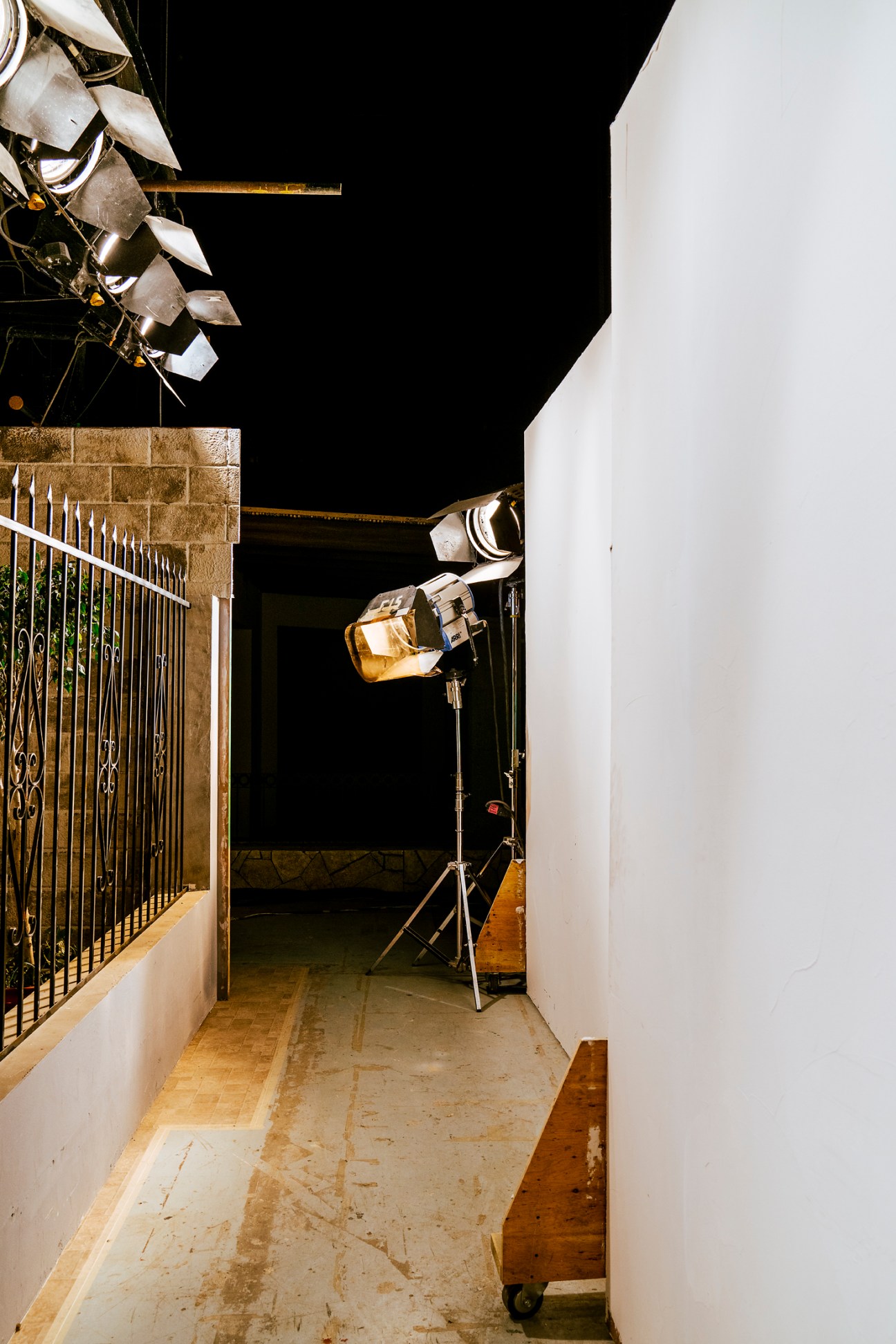 Professional lighting equipment and film gear set up on a film set
