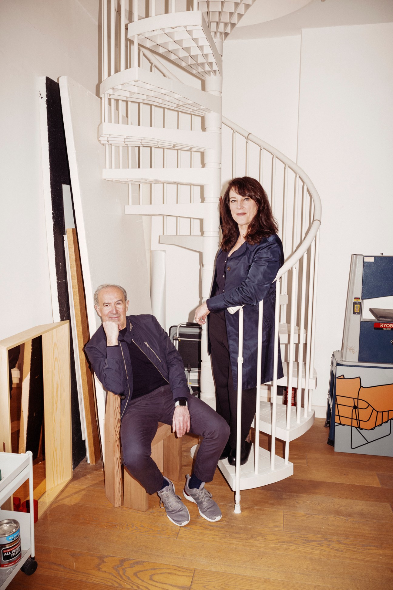 Sam Hecht and Kim Colin of Industrial Facility in their studio with white spiral staircase