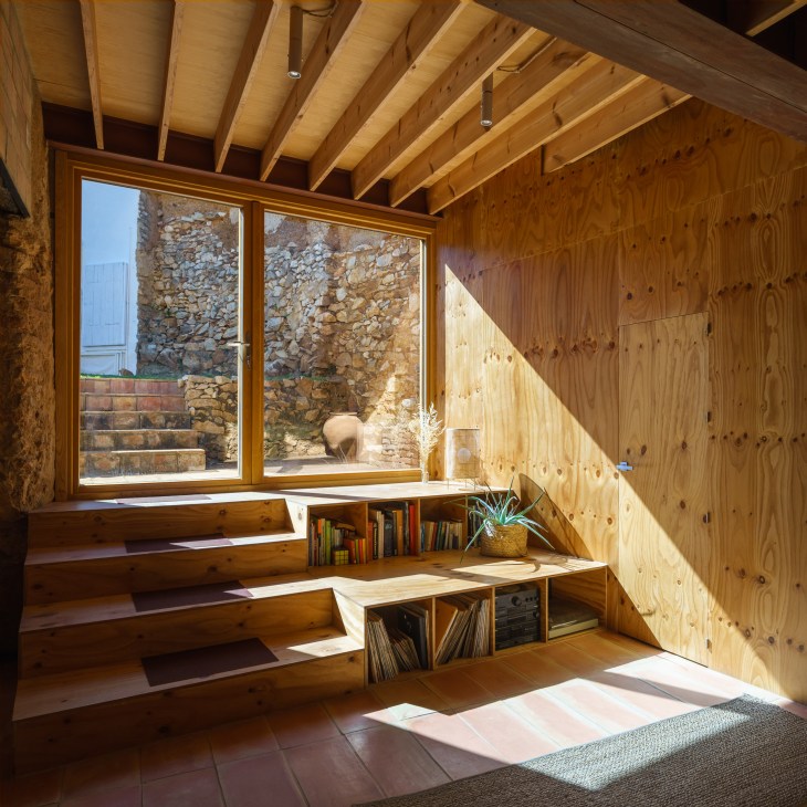 Large newly installed window overlooking the garden at La Posada, showcasing the balance between old and new elements