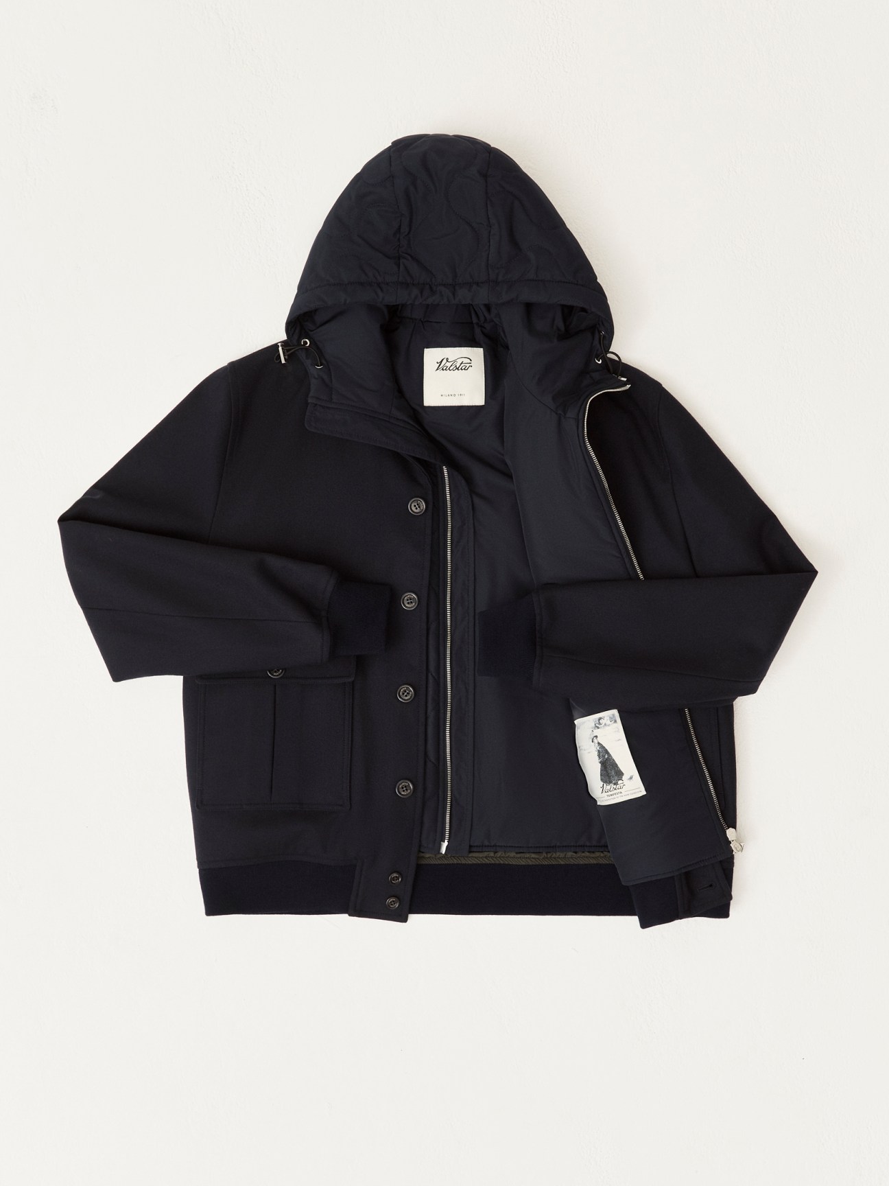 Navy hooded jacket by Valstar laid flat on white background, showing front zipper and button closure details