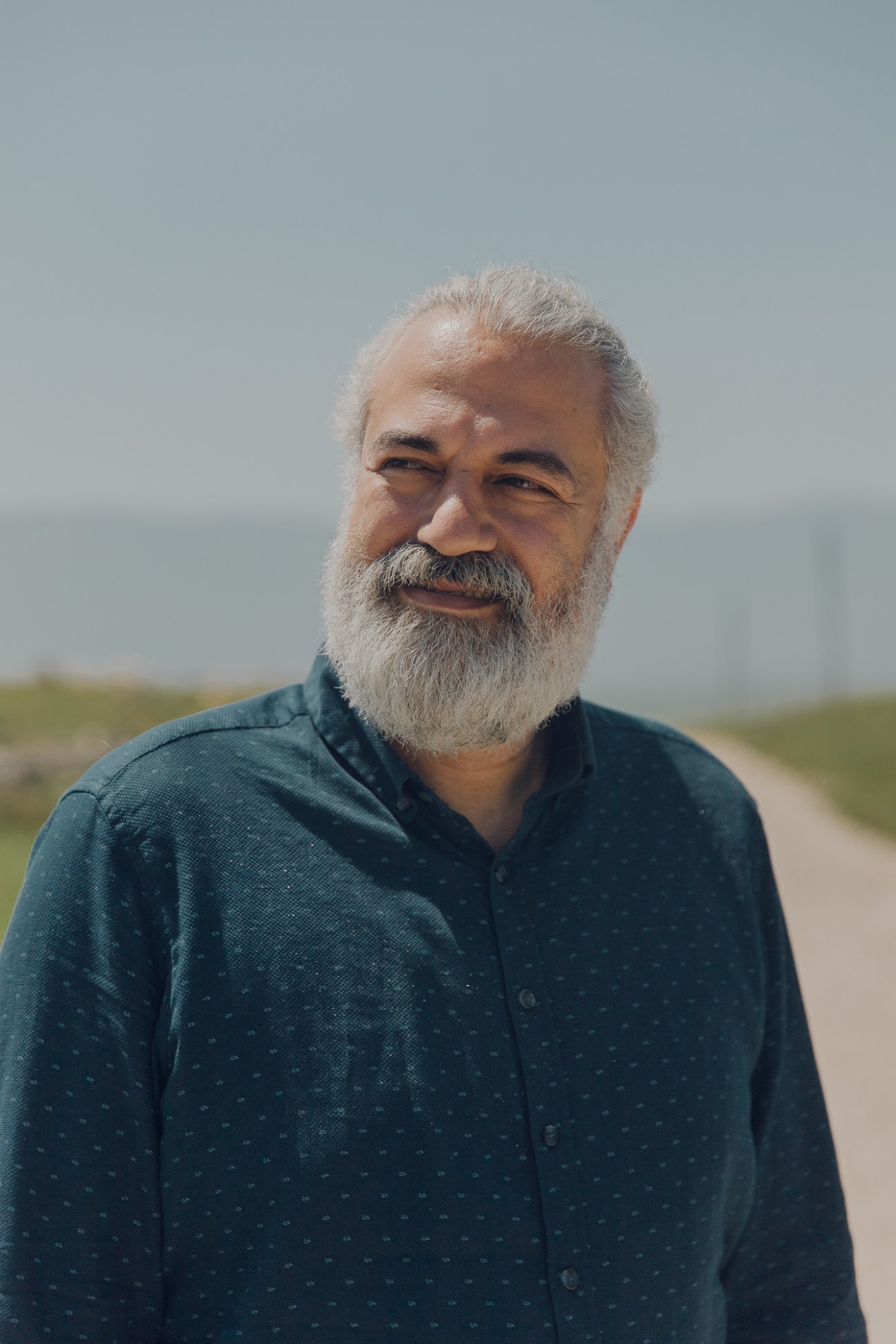Fadi Assi, founder of Golden Team tour guides, smiling outdoors