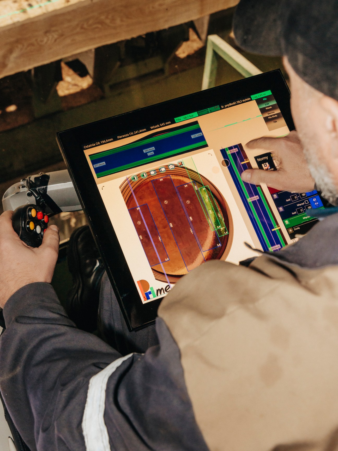 Modern log slicing machinery in operation