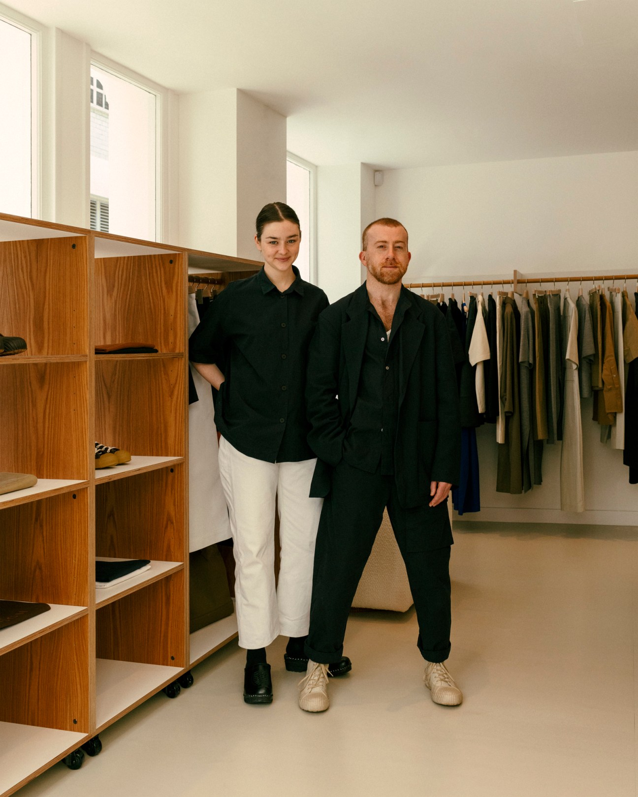 Studio Nicholson founder Nick Wakeman in navy clothing at her London flagship store
