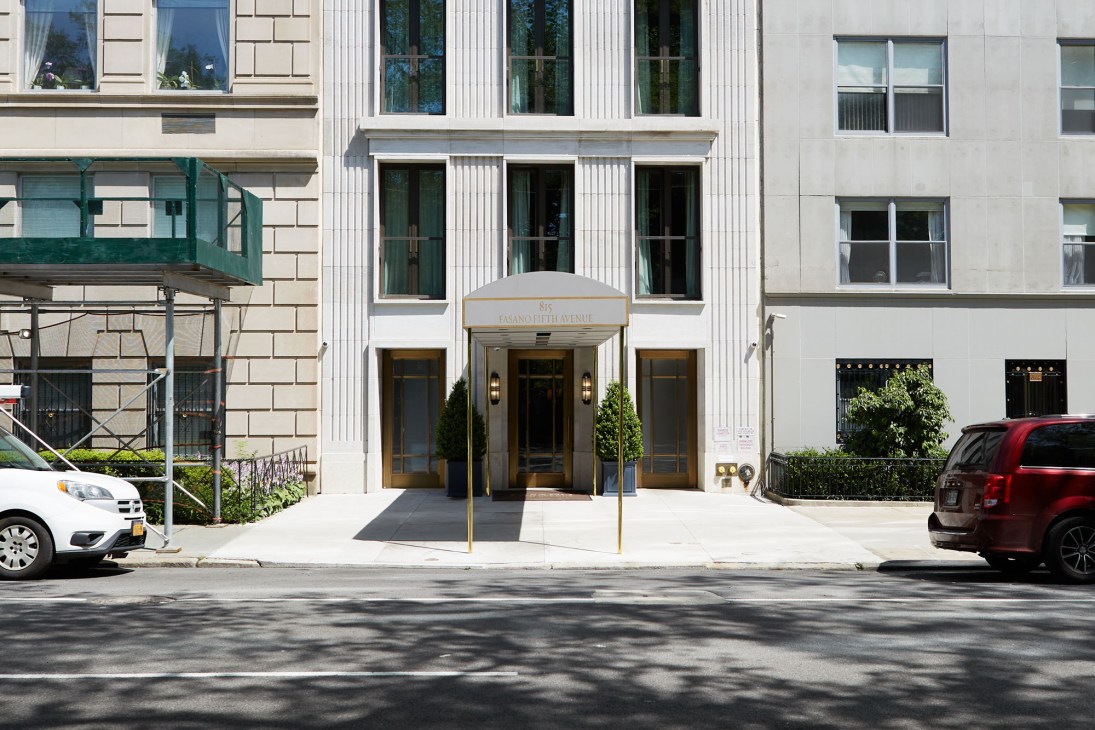Exterior view of Fasano Fifth Avenue's limestone building facade with classical columns and entrance canopy