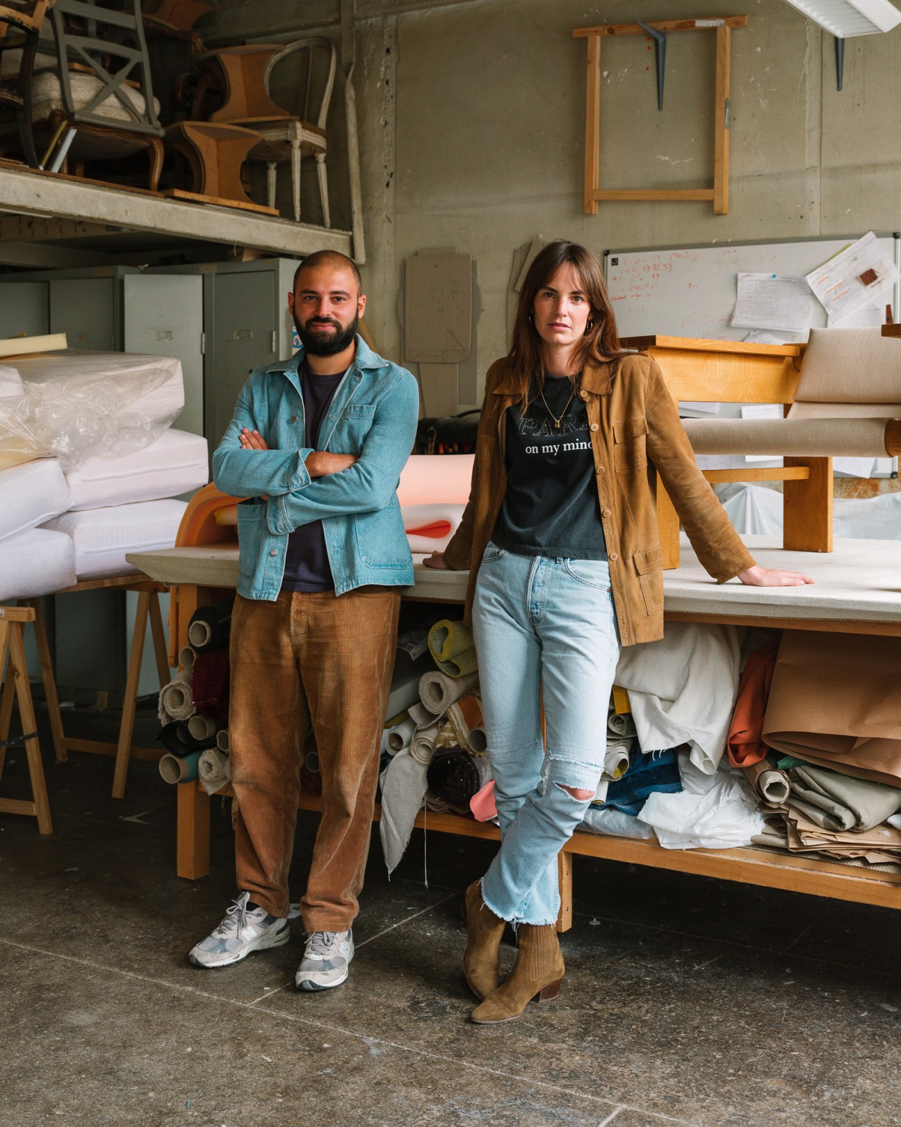 Sophie Gelinet and Cedric Gepner of Studio Haos in their Paris workshop surrounded by furniture and materials