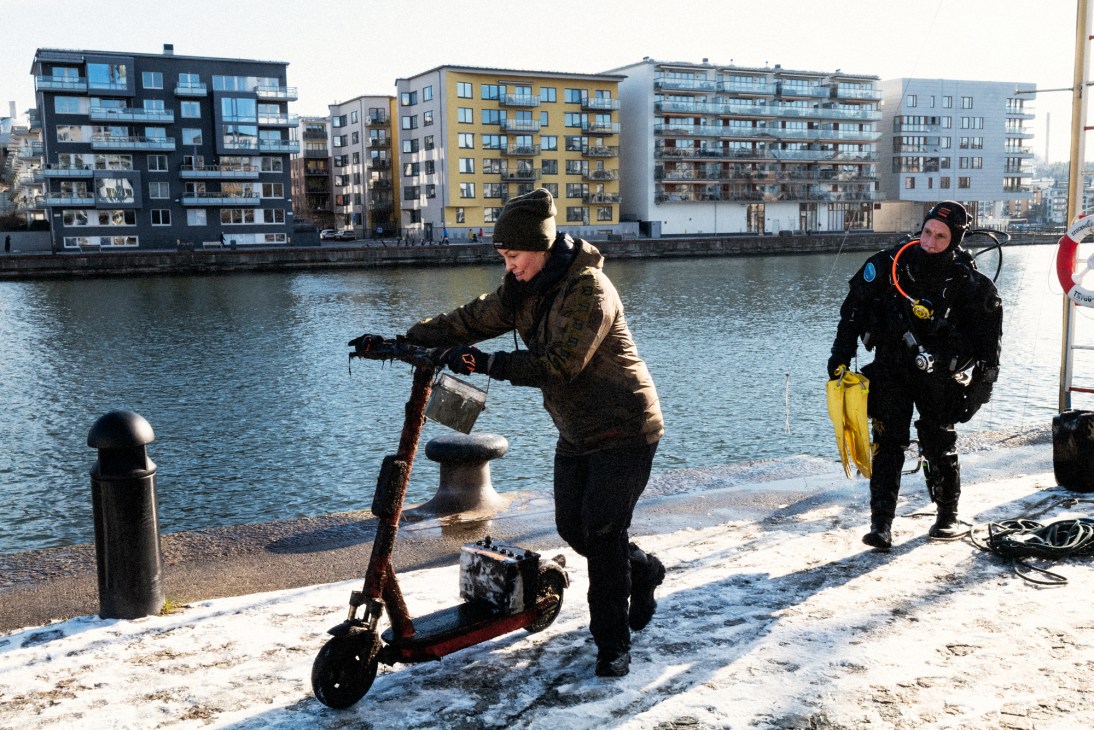 Damaged and waterlogged e-scooter retrieved from the bottom of the canal