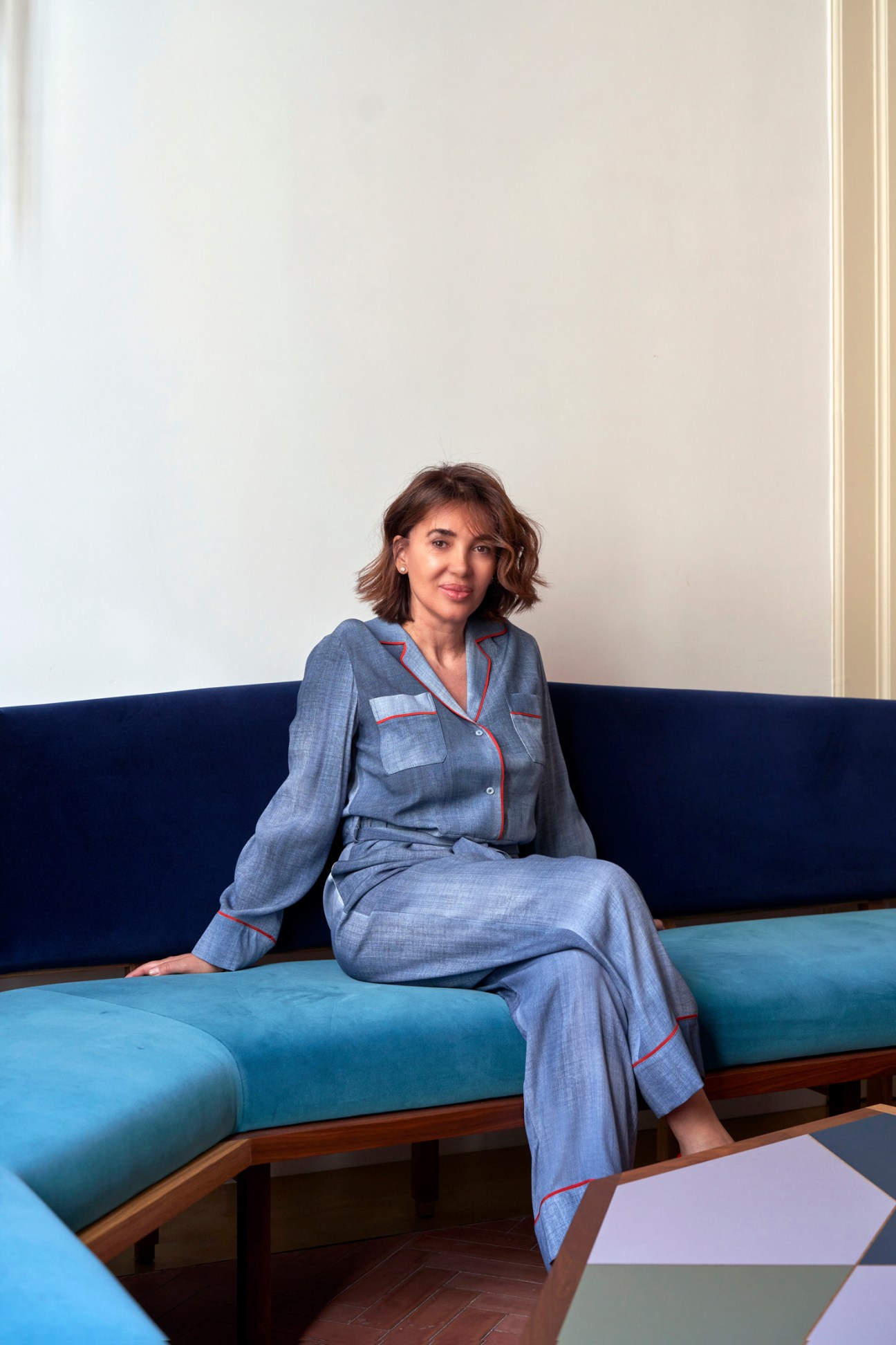 Anna Maria Enselmi, founder of Palazzo Luce, standing in her design hotel