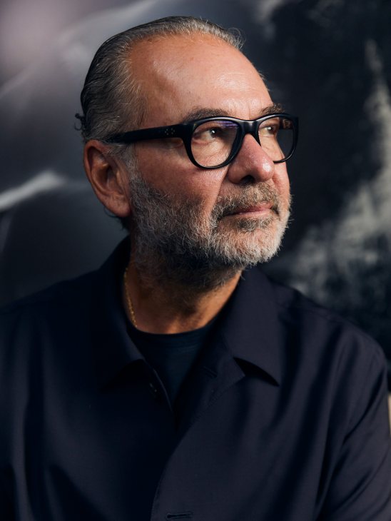 Remo Ruffini, chairman and CEO of Moncler, wearing navy clothing in a portrait
