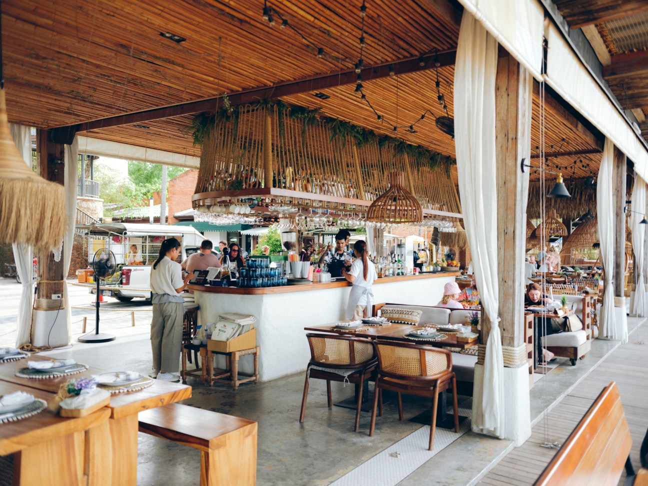 Beach bar setup at Coco Tam's with outdoor seating