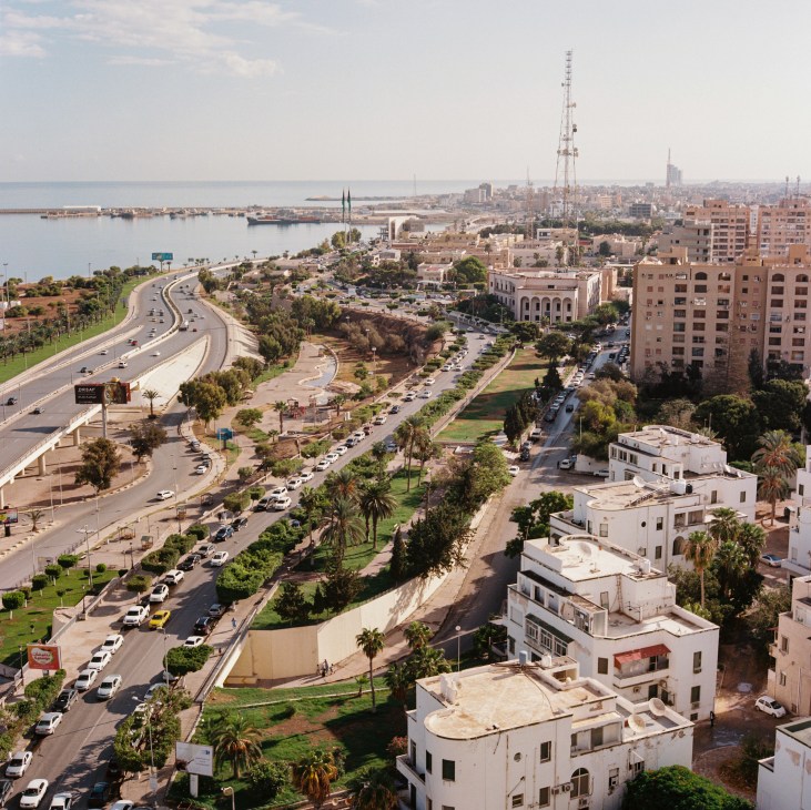 Aerial view of Tripoli showing highways, buildings, and Mediterranean coastline
