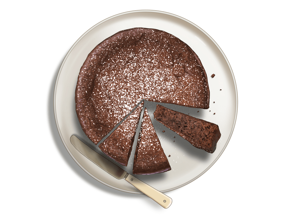 Rich dark chocolate cake dusted with icing sugar on a white plate with whipped cream and rum raisins