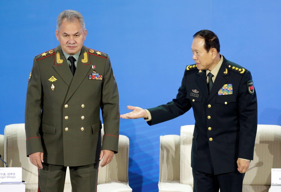 Chinese Defense Minister Wei Fenghe meeting with Russian counterpart Sergei Shoigu at international security conference