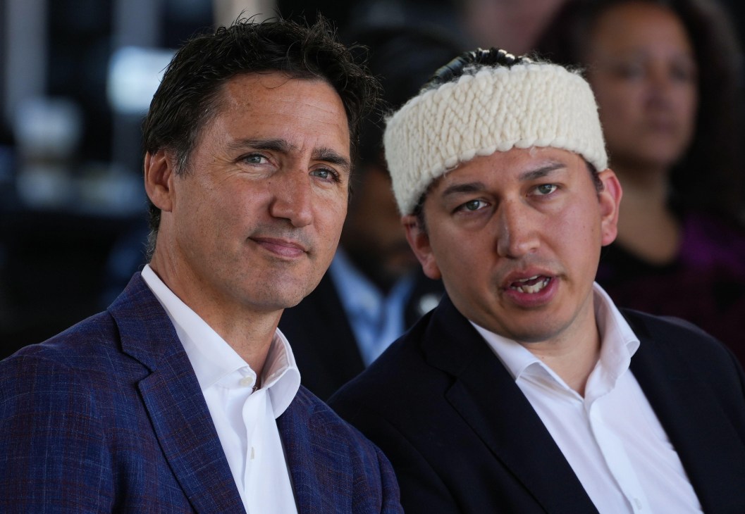 Prime Minister Justin Trudeau and First Nations leader Khelsilem participate in a groundbreaking ceremony