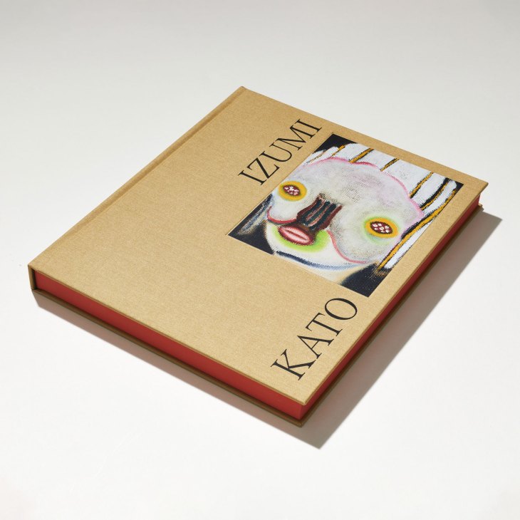 Izumi Kato hardcover book with tan cover featuring colorful artistic cat illustration by Perrotin gallery.