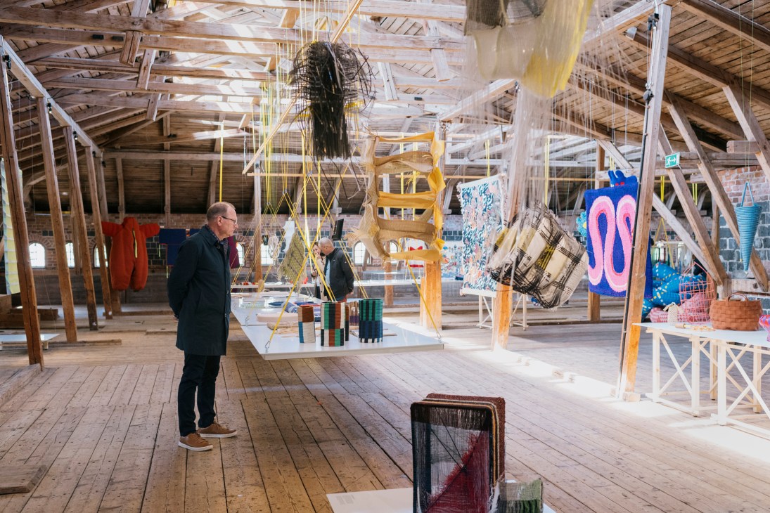 Gallery space inside the old granary at Fiskars Village showing exhibition installations