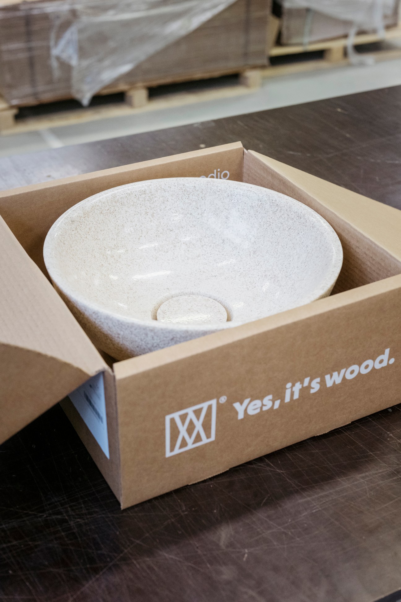 Woodio bowl showing the smooth finish and wood chip texture of their composite material