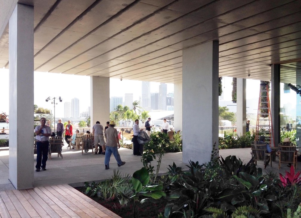 Outdoor terrace at Pérez Art Museum Miami with covered seating area overlooking water and city skyline