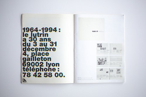 Open publication showing bold black typography on left page and layout spreads on right page.