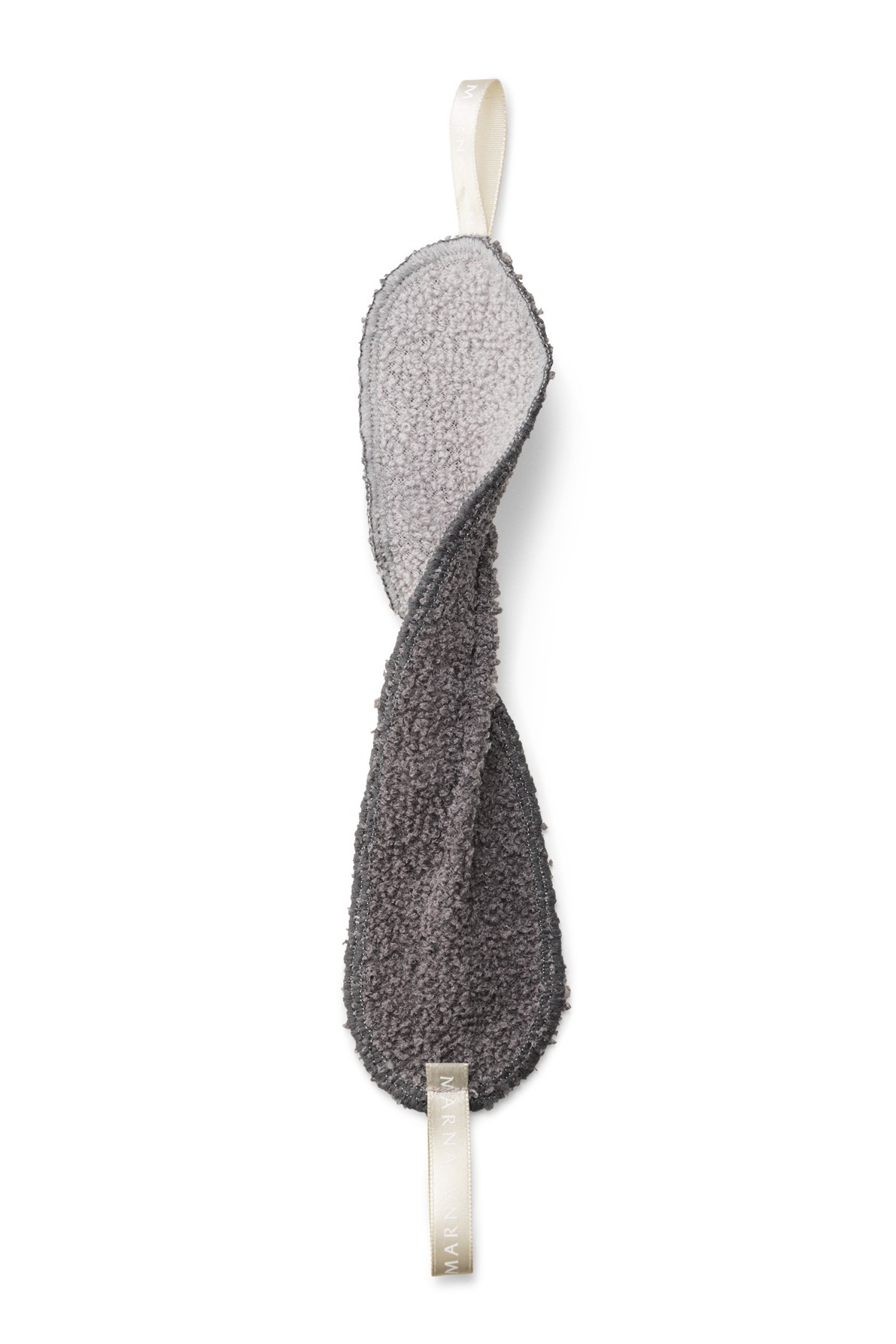 Marna tap-cleaning cloth with cream ribbon and textured gray surface for cleaning faucet backs.