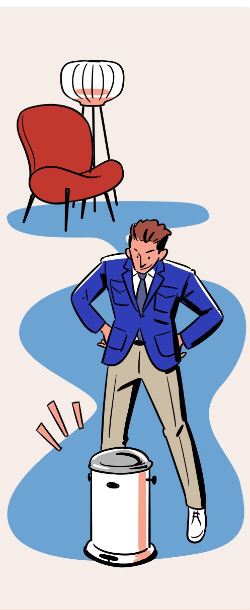 Business professional in suit standing confidently with hands on hips next to waste bin