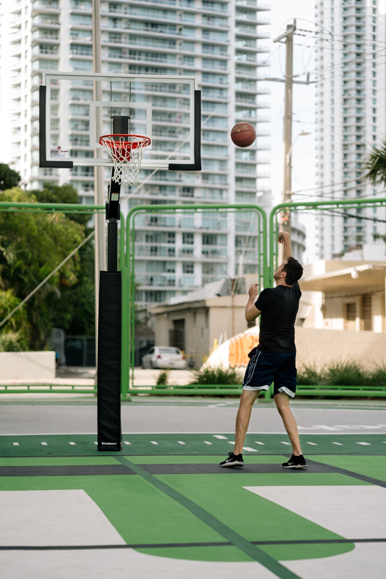 The Underline park space in Miami showing landscaping beneath elevated railway