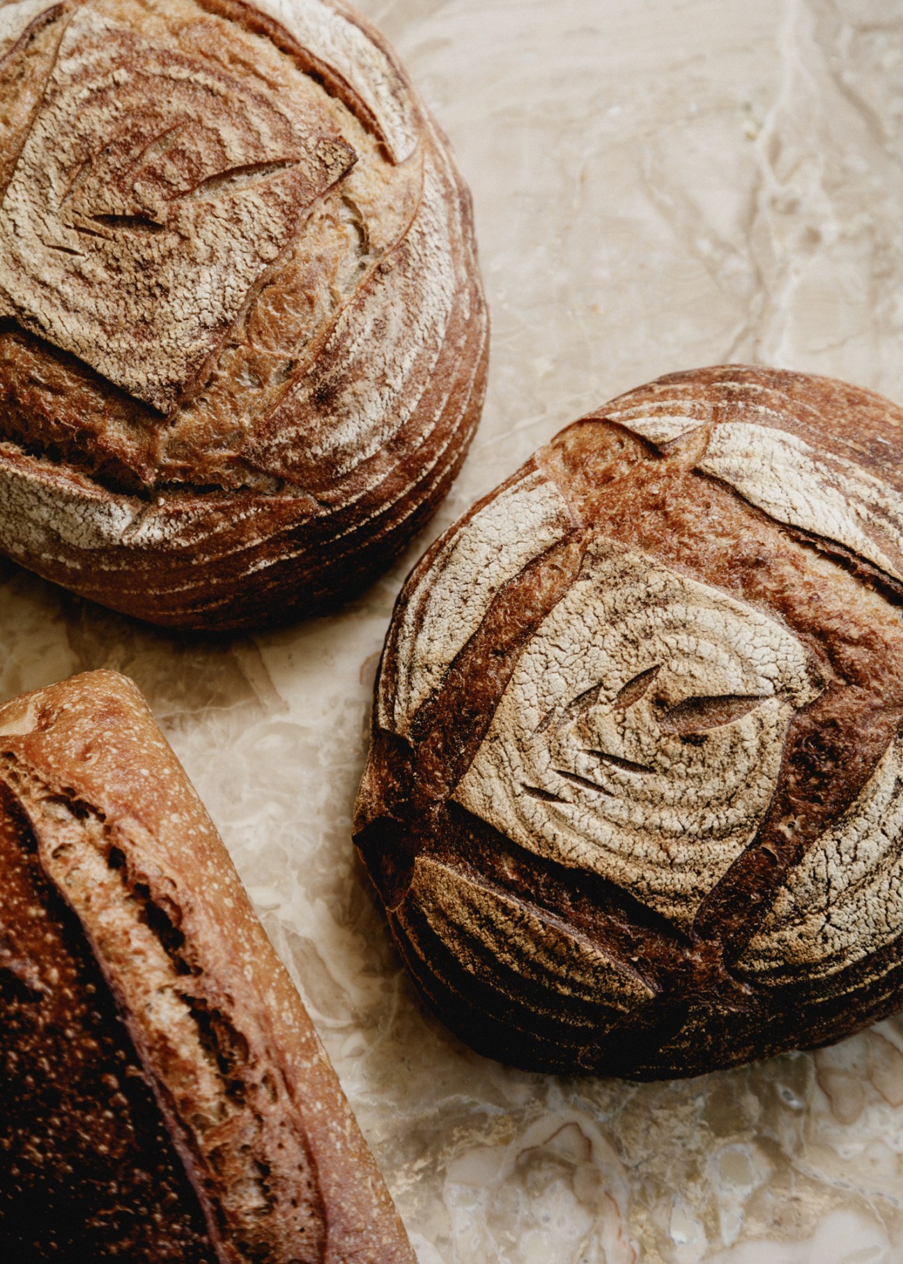 Bright bakery interior with flour milling equipment and natural light at Flourist Vancouver