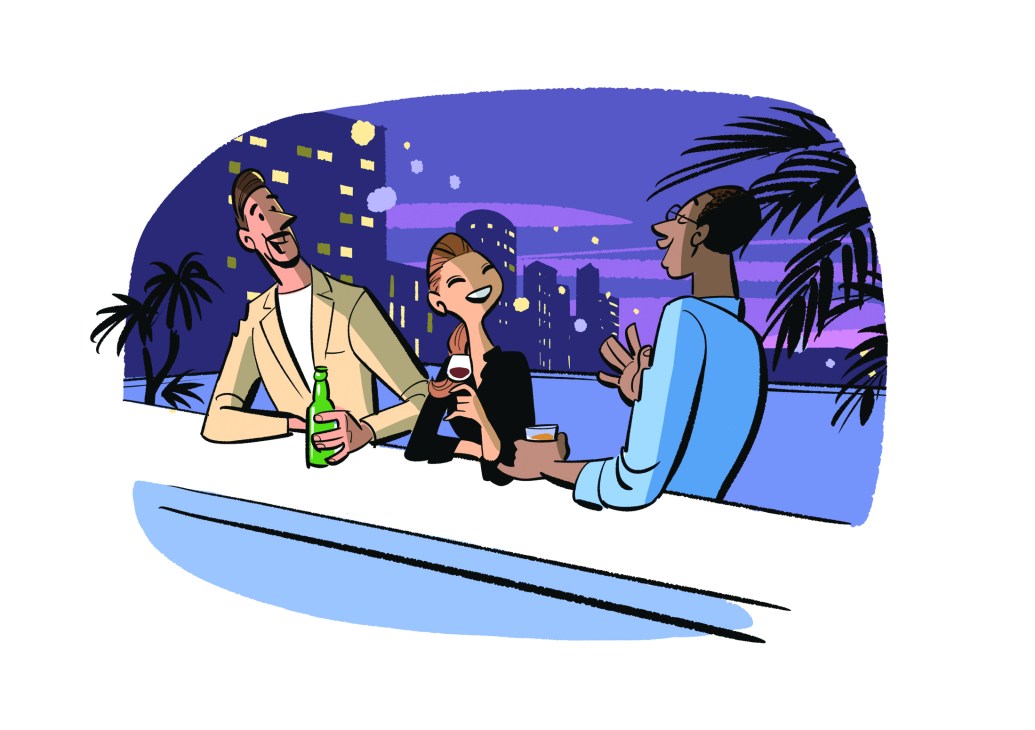 Three people socializing at an outdoor rooftop bar with city skyline and palm trees in background at night