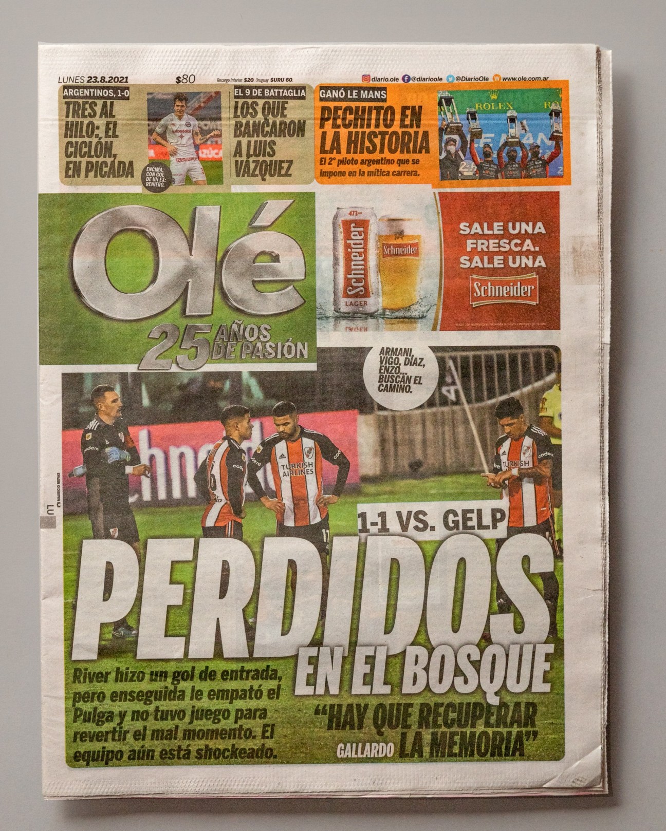 Front page of Olé newspaper featuring football match coverage and advertisements.