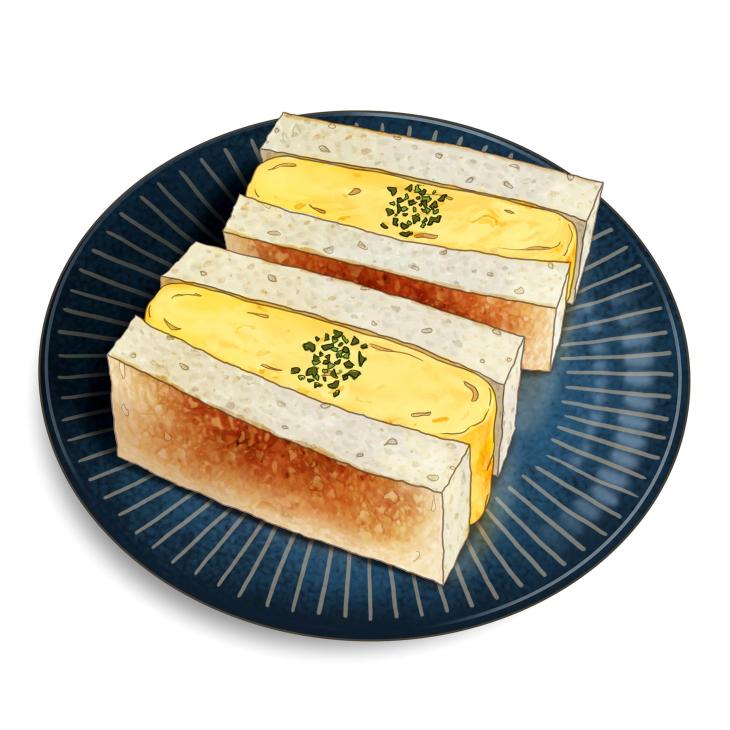 Tamago sandwiches cut in half and arranged on a blue ridged plate
