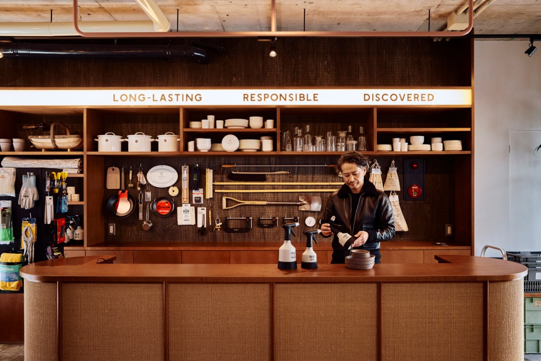Interior view of Lost and Found shop showing wooden shelving with organized homeware and kitchen items