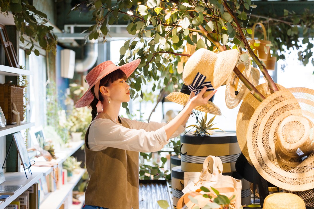 Display of handcrafted hats and accessories in the retail space