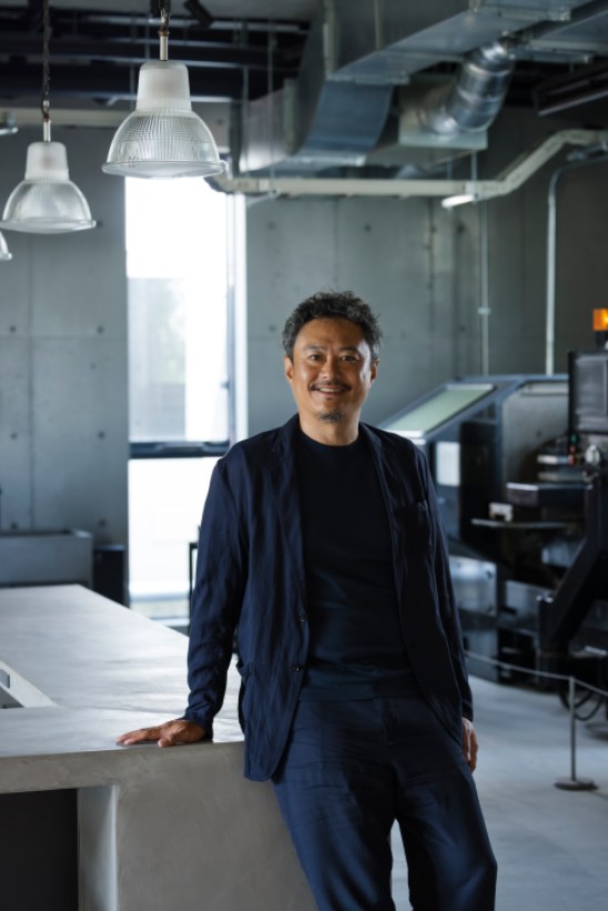 Portrait of Kuni Hijikata, co-founder of Vermicular, in the company's showroom
