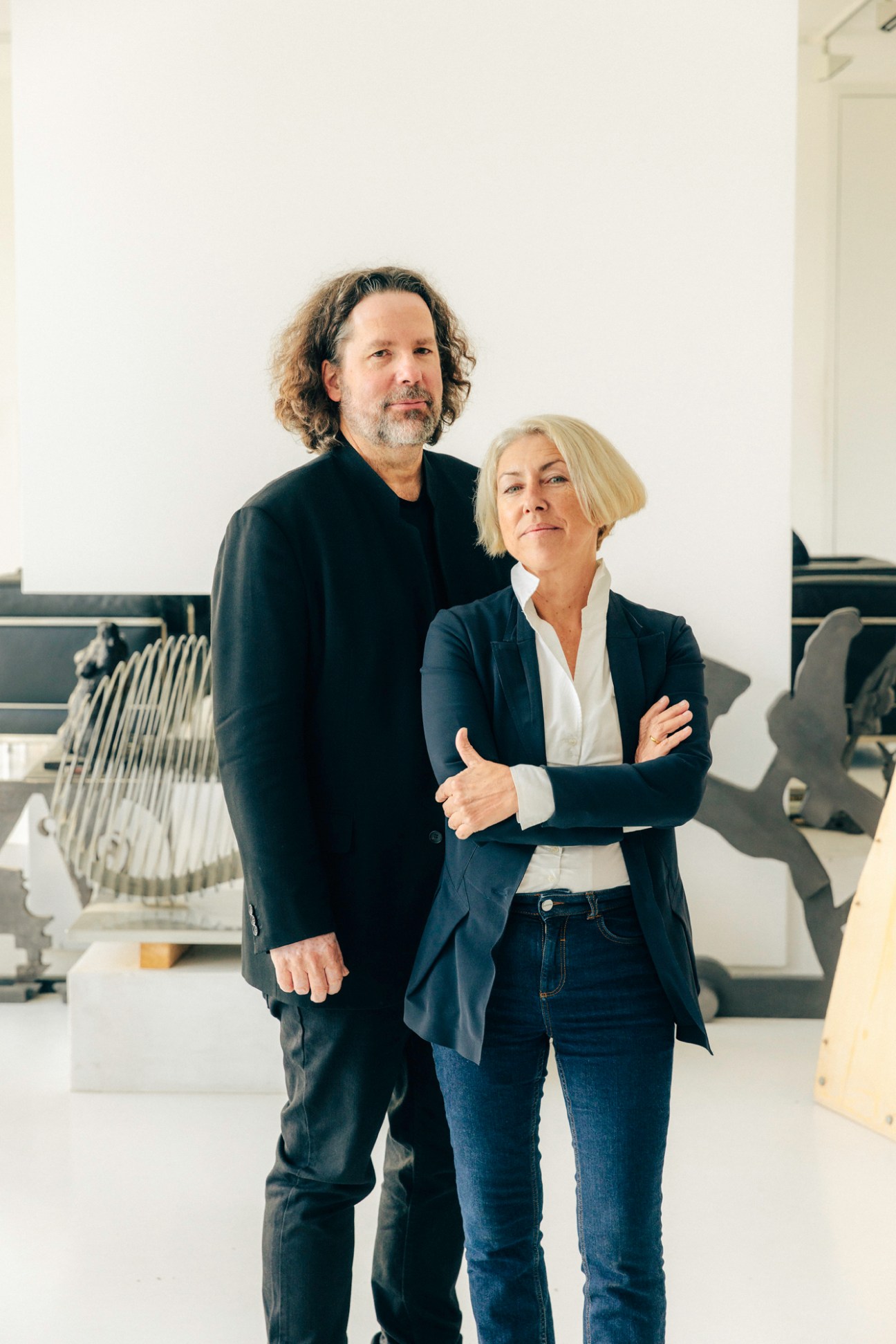 Designers Stuart Veech and Mascha Veech-Kosmatschof standing together in their Vienna studio